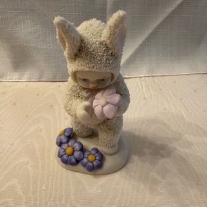 Department 56 snowbaby with purple flowers